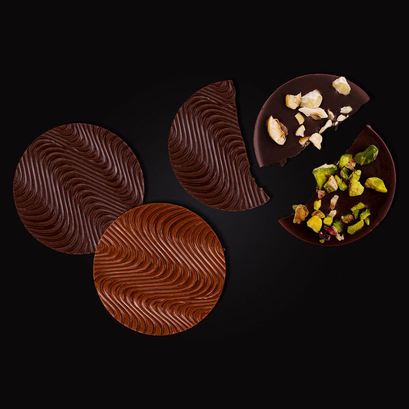 goalz milk and dark chocolates with pistachio and hazelnut toppings